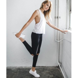 Crne sportske tajice s rupama na koljenima za žene