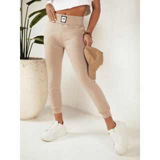 Ženska trenirka bež boje sa zakrpom